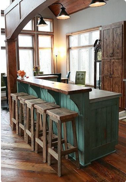 cottage kitchen with reclaimed palette wood flooring and cabinetry