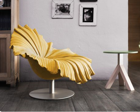 funky bloom chair in vibrant yellow in a relaxed small living room