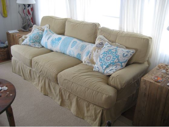ill-fitting slipcover on a sofa make the room look intidy