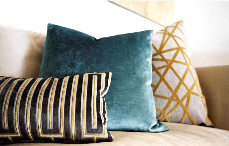 colourful array of toss cushions in graphic geometric patterns