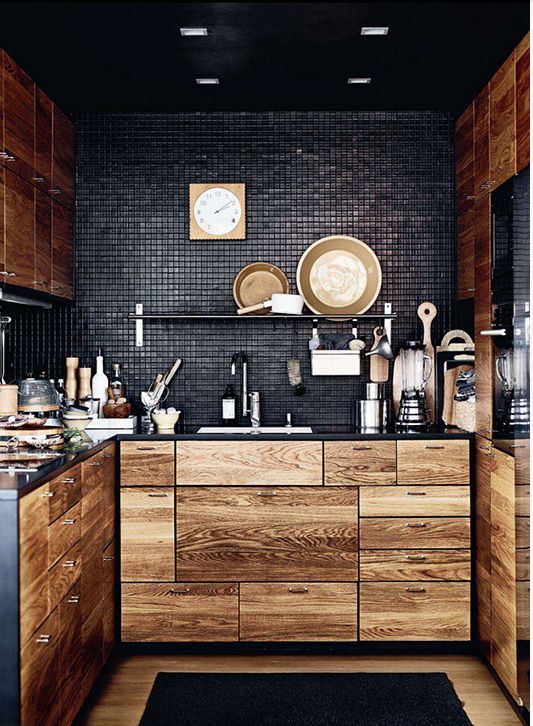 dramatic casual kitchen with raw wood cabinetry, black ceiling, and black mosaic backsplash tile to the ceiling