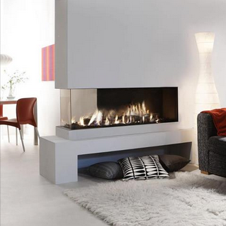 white living room with shag rug and 3 sided fireplace