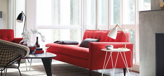 contemporary living room with red tufted sofa with open side chaise