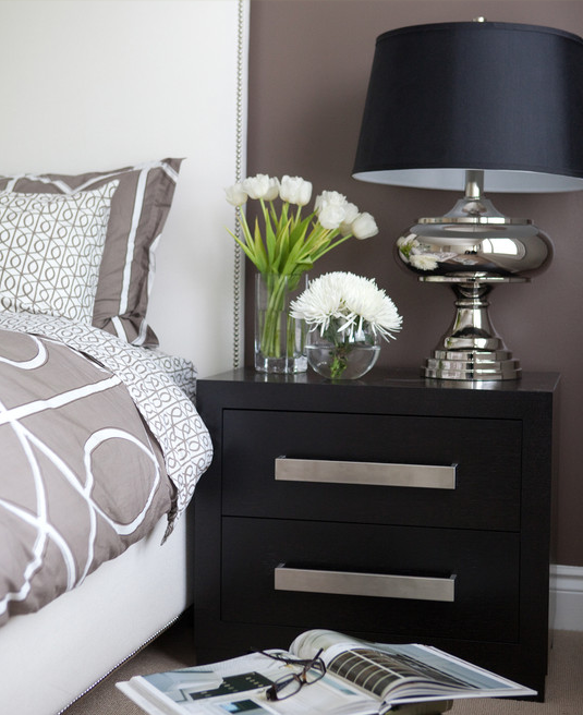 black furniture with graphic bedding