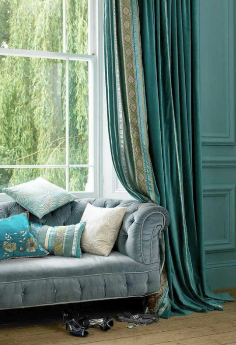 custom drapes on tufted sofa