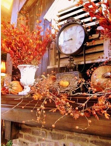 beautiful fall decor with urn of Chinese lanterns on fireplace mantel