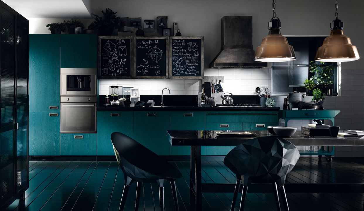 large upscale urban chic kitchen with washed turquoise oak cabinets with black countertops and industrial lighting with chalkboard cabinet faces scavolini