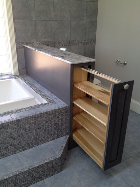 pullout shampoo storage at end of bathtub surround